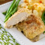 paleo baked chicken on a plate with green beans