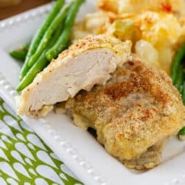 paleo baked chicken on a plate with green beans