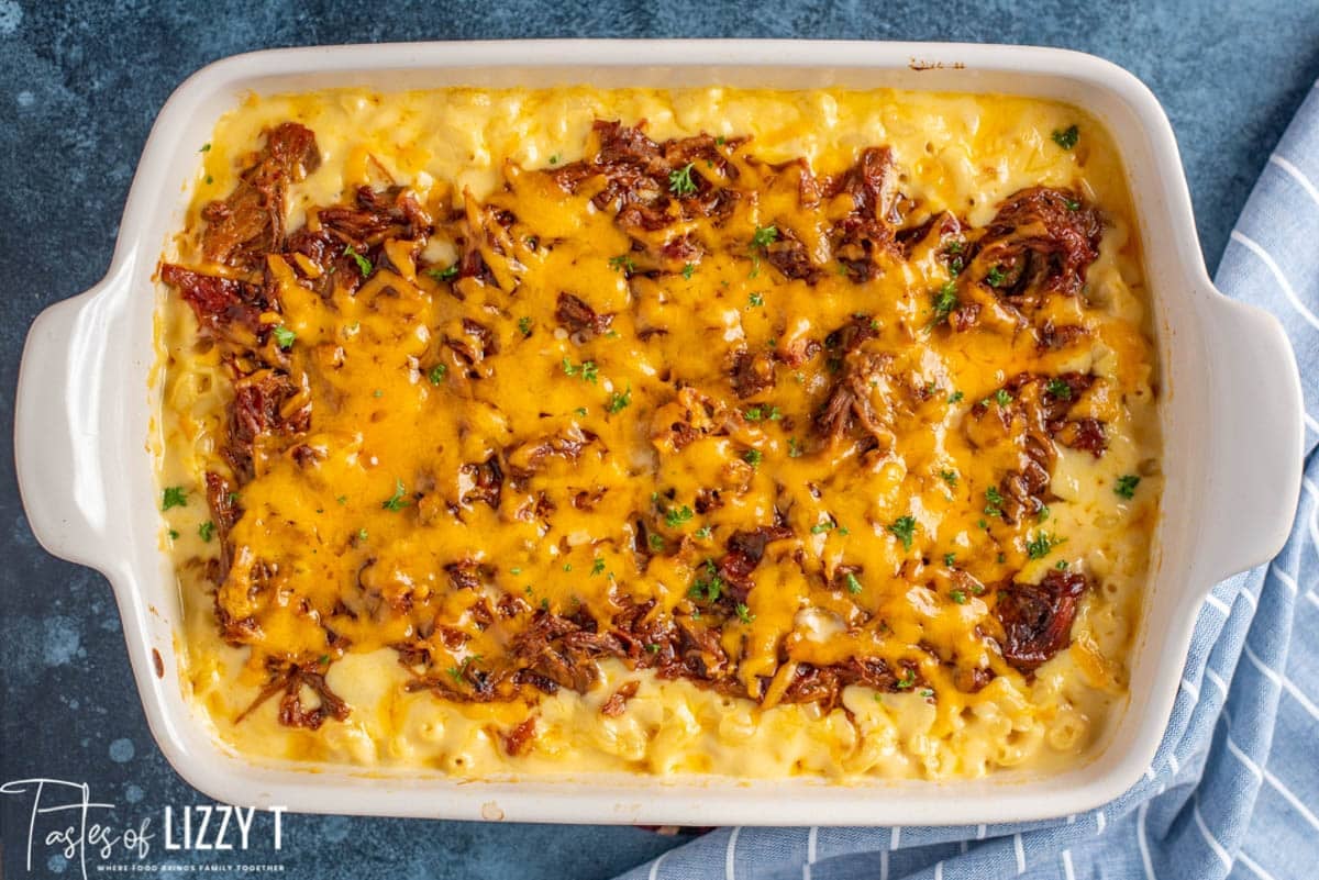 overhead view of pulled pork mac and cheese in a white dish