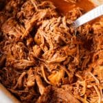 closeup of bbq pulled pork on a spoon
