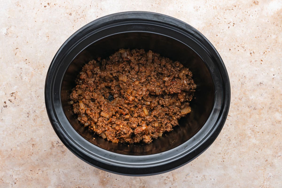 seasoned ground beef in a slow cooker