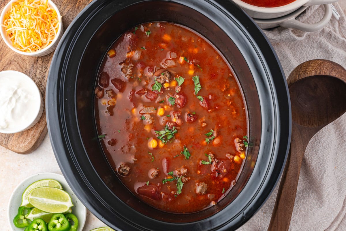 taco soup in a slow cooker on a table