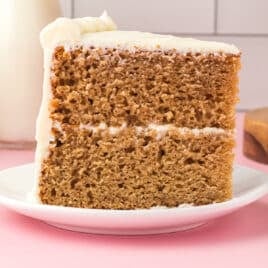 a piece of applesauce spice cake on a plate