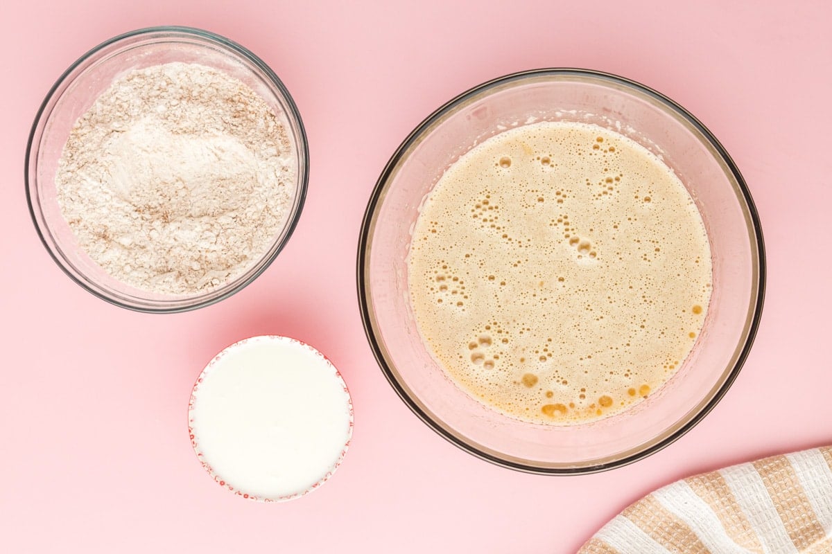 bowls with wet and dry ingredients for cake on a table