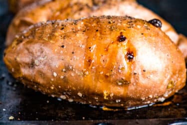 a baked sweet potato on a baking sheet
