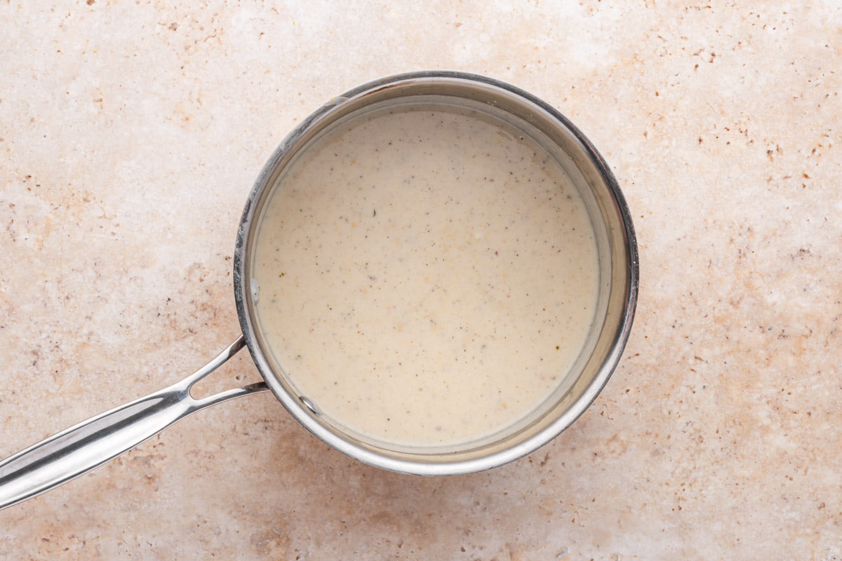 homemade white sauce in a saucepan