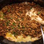 crockpot chicken and stuffing with a spoon