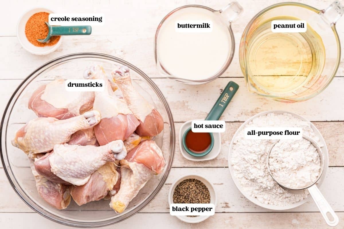 fried chicken drumsticks ingredients on a table