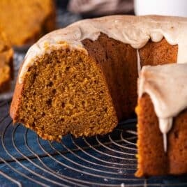 pumpkin bundt cake with maple cinnamon glaze on a wire rack