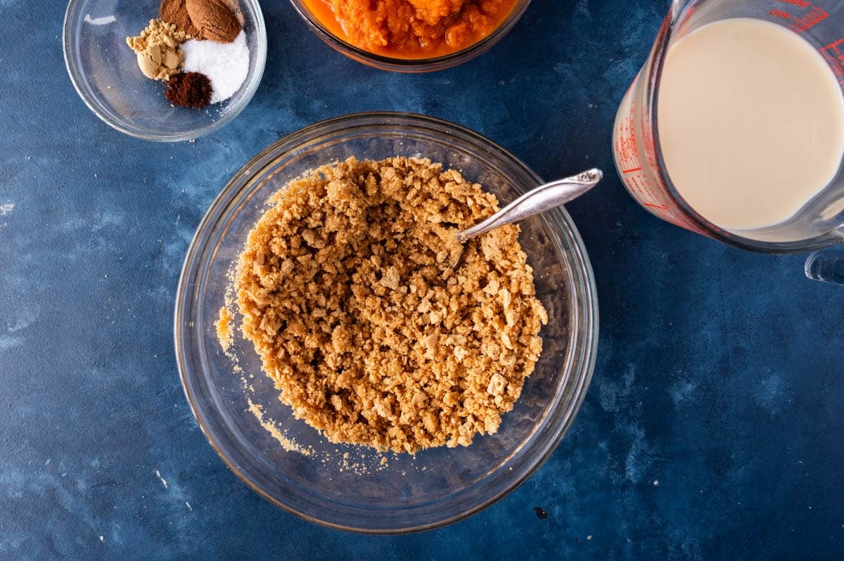 graham cracker crumbs in a bowl with a spoon