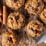 pumpkin spice chocolate chip cookies on a wire rack