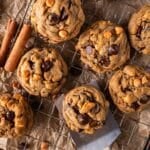 pumpkin spice chocolate chip cookies on a wire rack