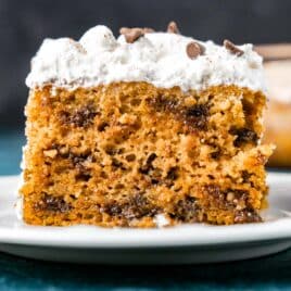 a piece of pumpkin poke cake on a plate