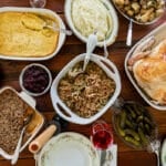 a table full of thanksgiving sides
