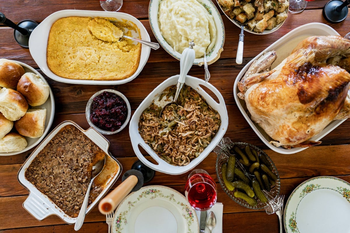 a table full of thanksgiving sides