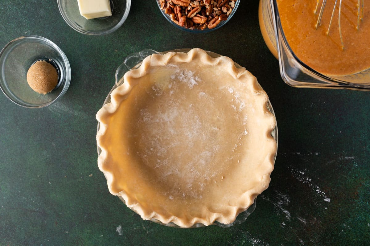 unbaked pie dough pressed into a pie plate