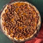 baked pecan pumpkin pie on a table