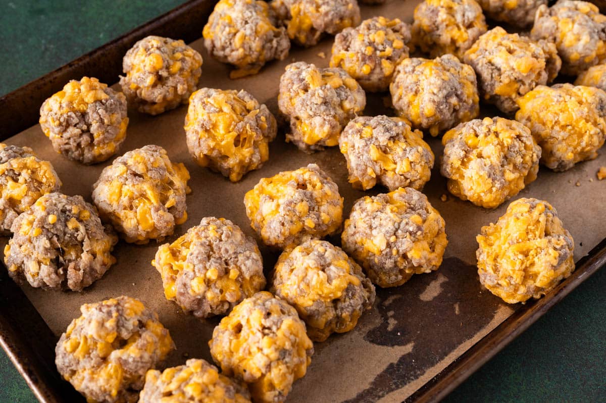 baked sausage meatballs on a pan