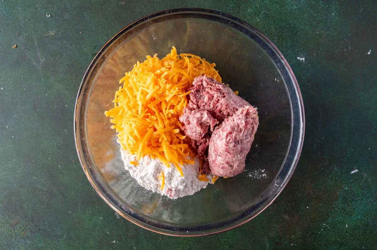 bisquick, cheese and sausage in a bowl
