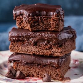 a stack of 3 cake mix brownies on a plate