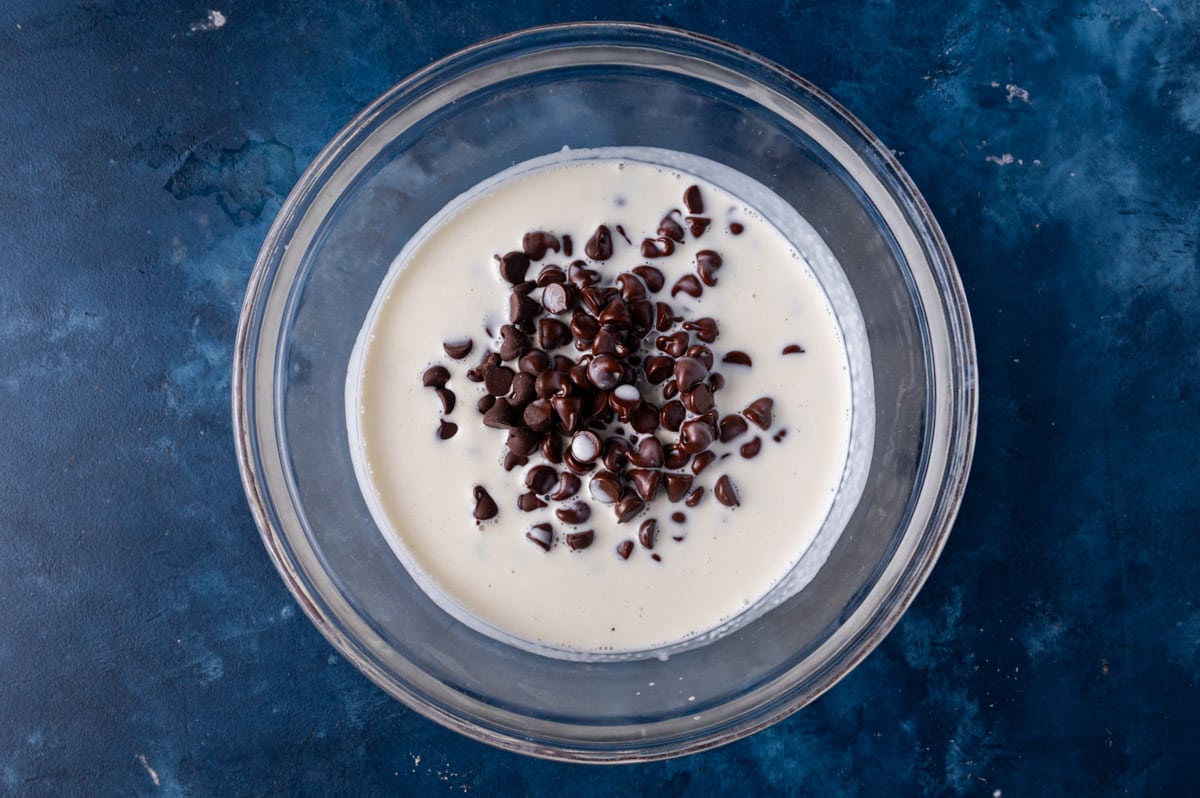 chocolate chips and heavy cream in a bowl