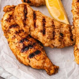 grilled chicken tenders on parchment paper