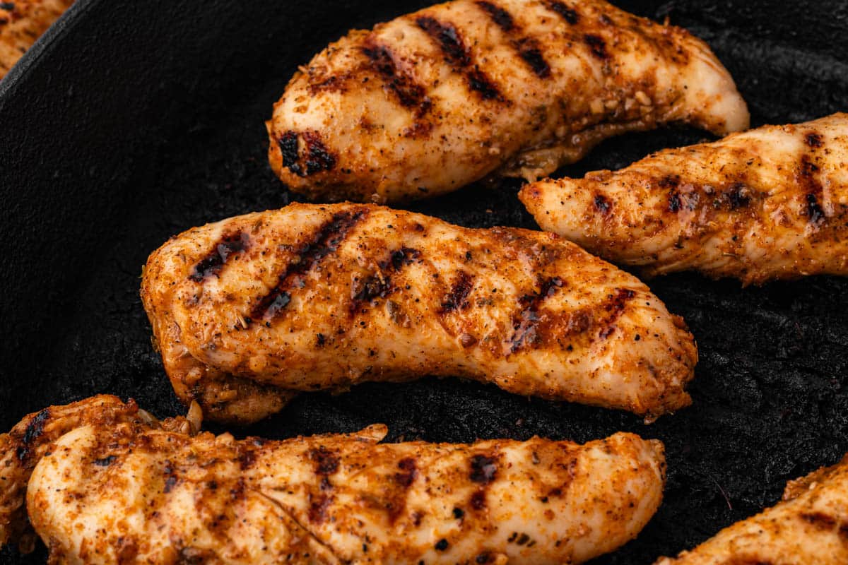 grilled chicken tenders in a pan
