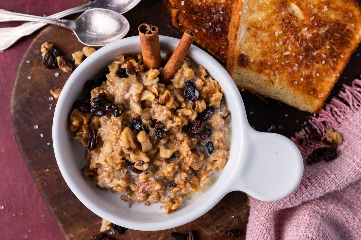 overhead view of hearty oatmeal with raisins and walnuts