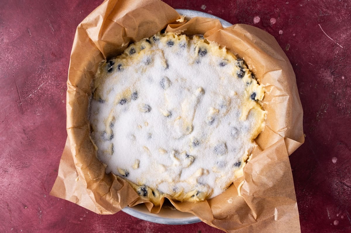 an unbaked cake with sugar on top