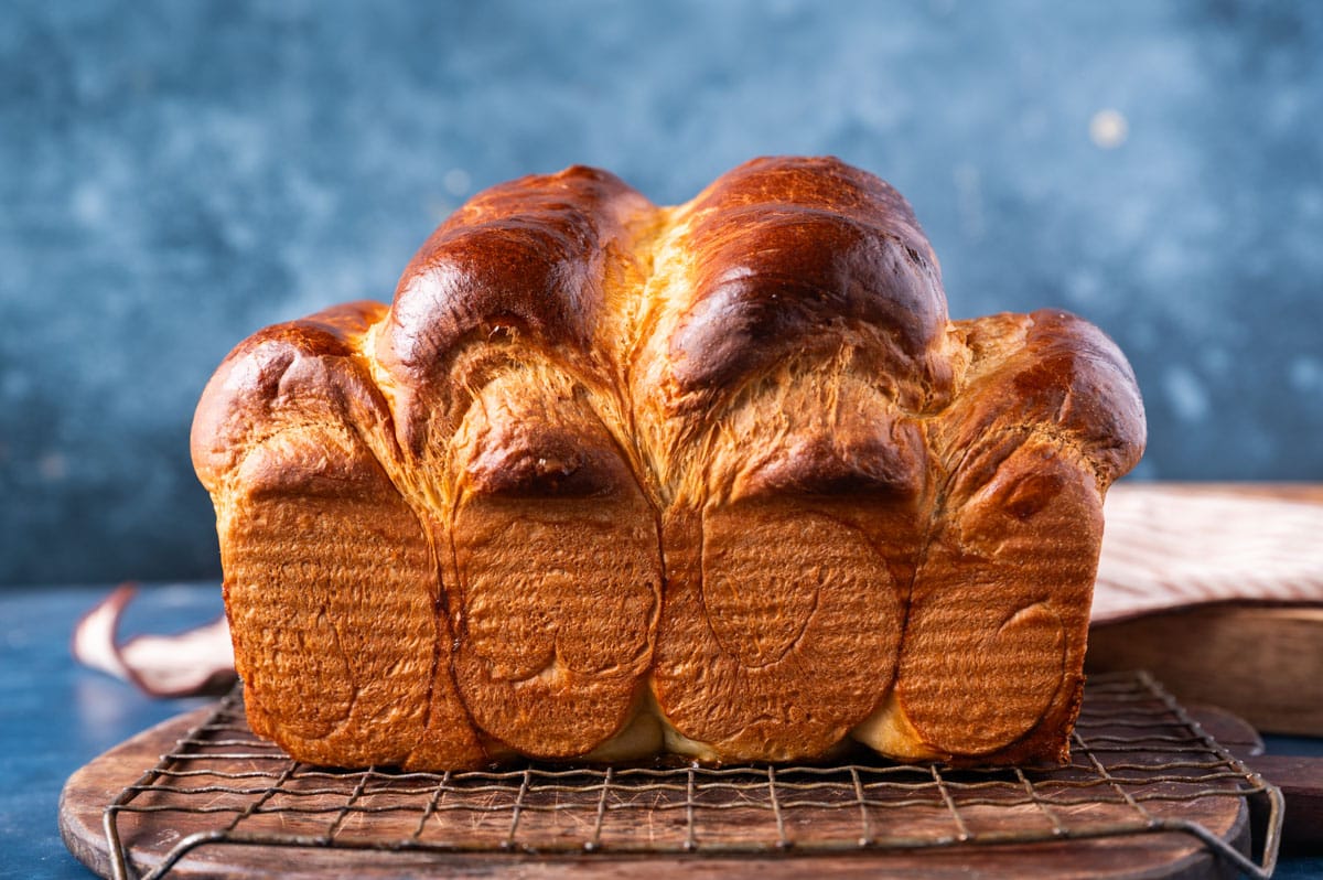 a loaf of milk bread sitting on a table