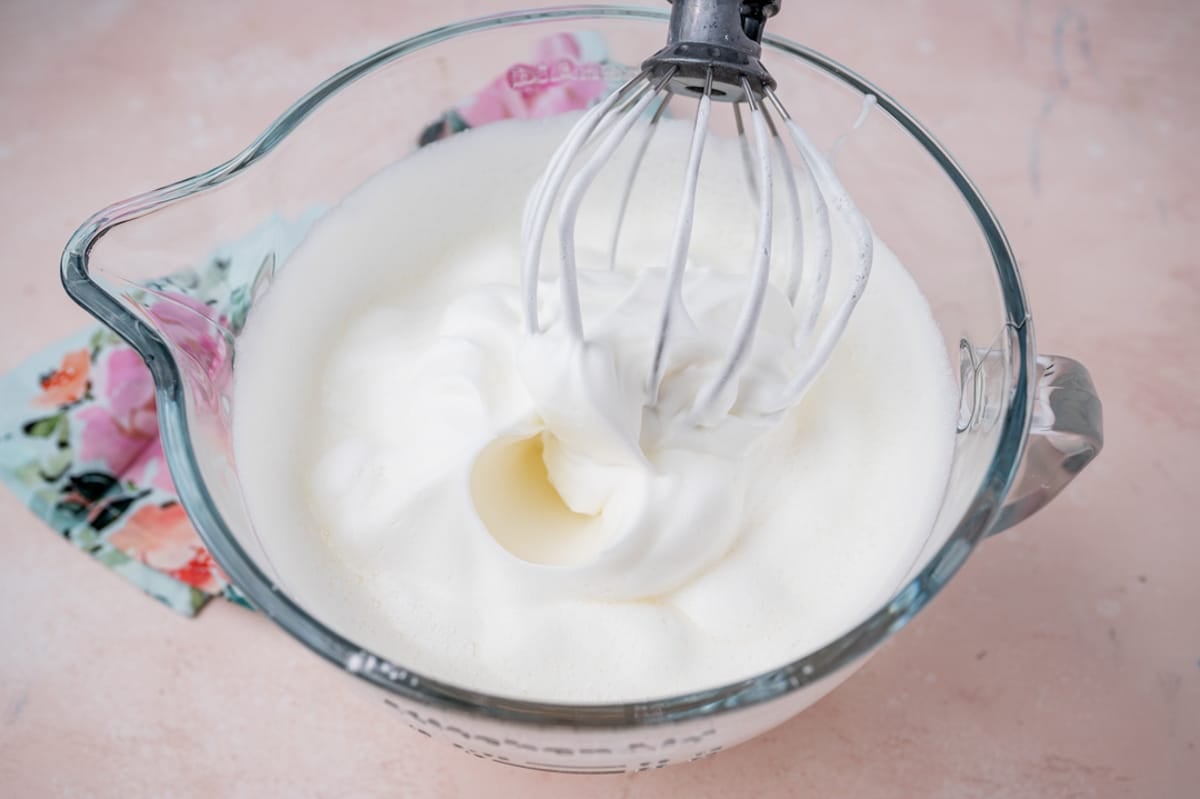 whipped egg whites in a bowl