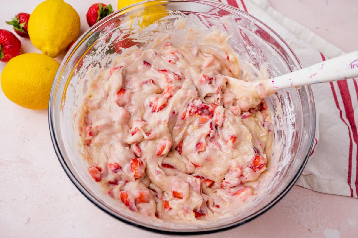 cake batter with strawberries in a bowl