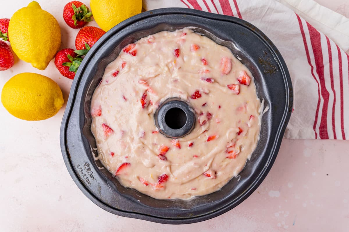 unbaked strawberry lemonade cake in a pan