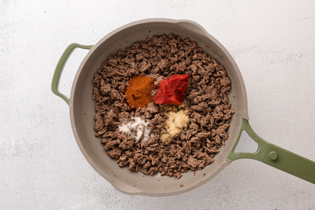 crumbled ground beef and seasonings in a skillet