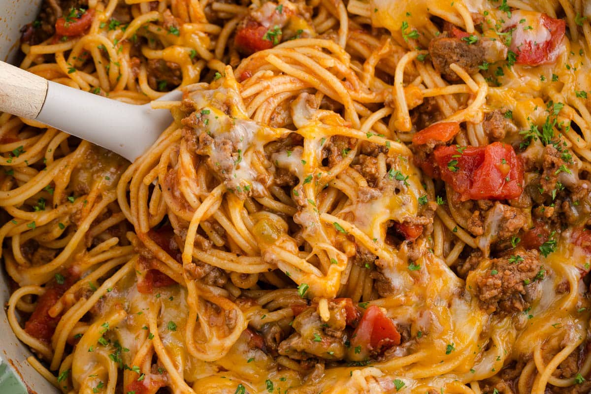 closeup of spaghetti with taco meat in a skillet