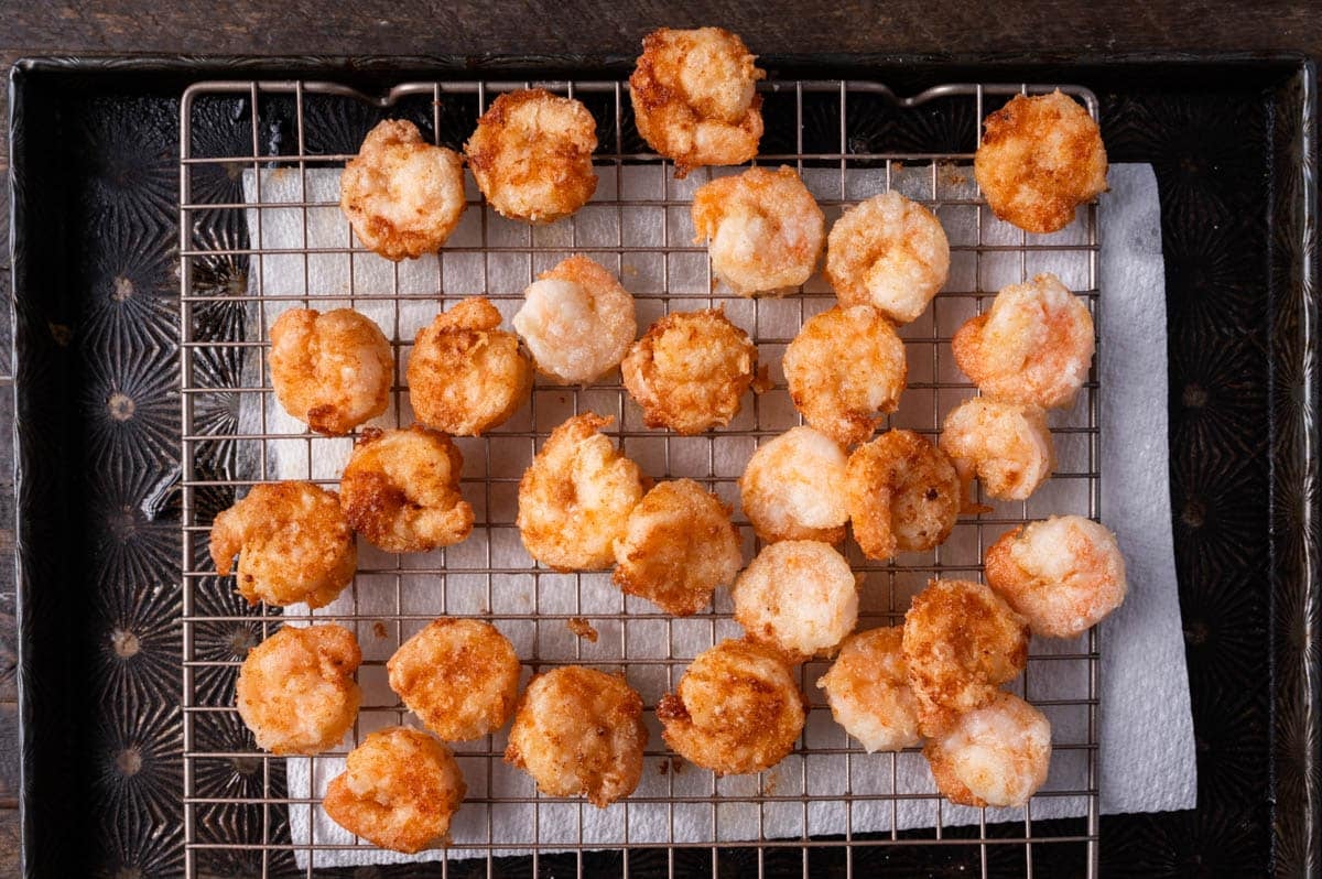fried shrimp on a wire rack