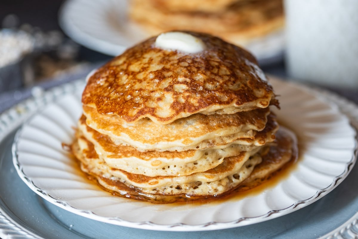 a stack of oatmeal pancakes on a plate