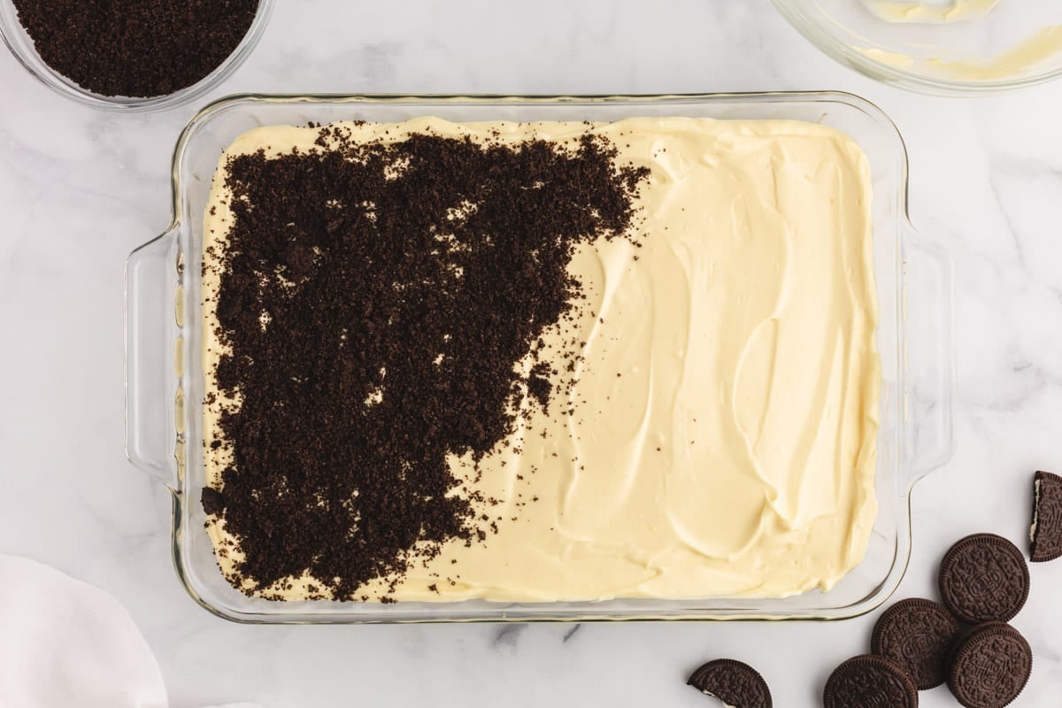 cheesecake filling with oreo cookie crumbs on top
