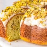 glazed pistahio bundt cake on a plate