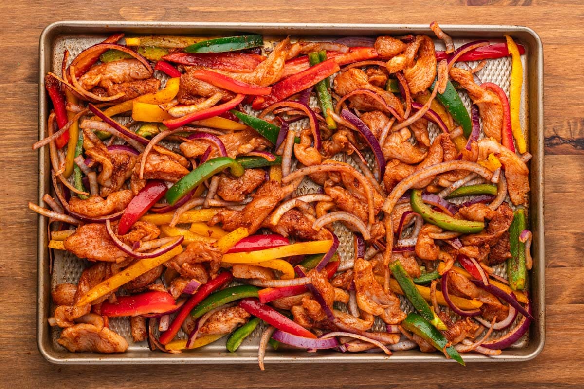 sheet pan fajitas with chicken on a a table