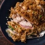 a sliced piece of chicken cordon blue on a plate