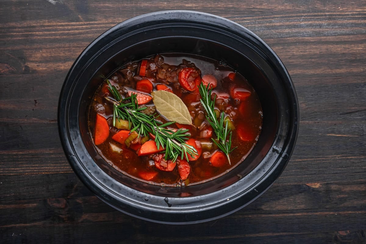 uncooked slow cooker short ribs in a pot