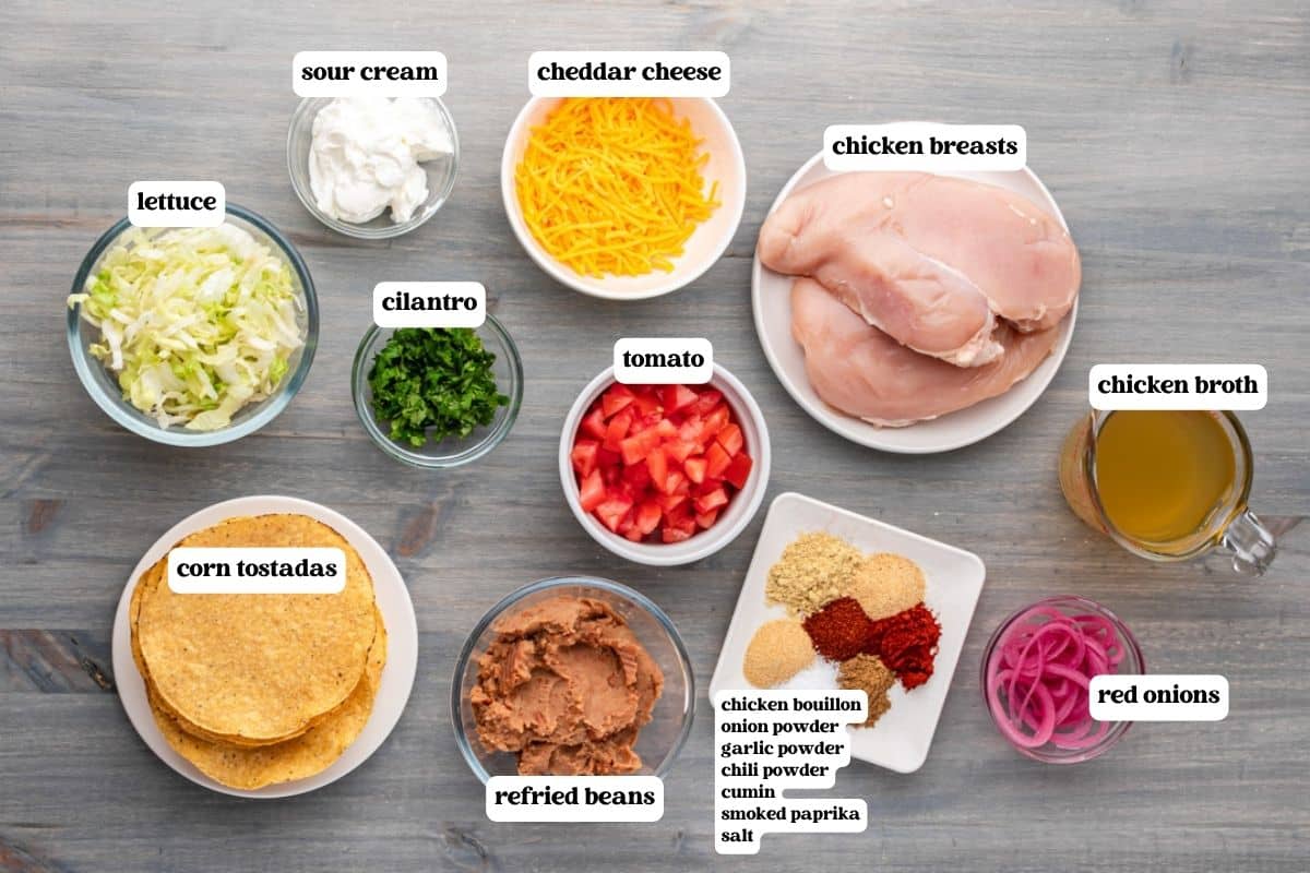 ingredients for chicken tostadas on a table
