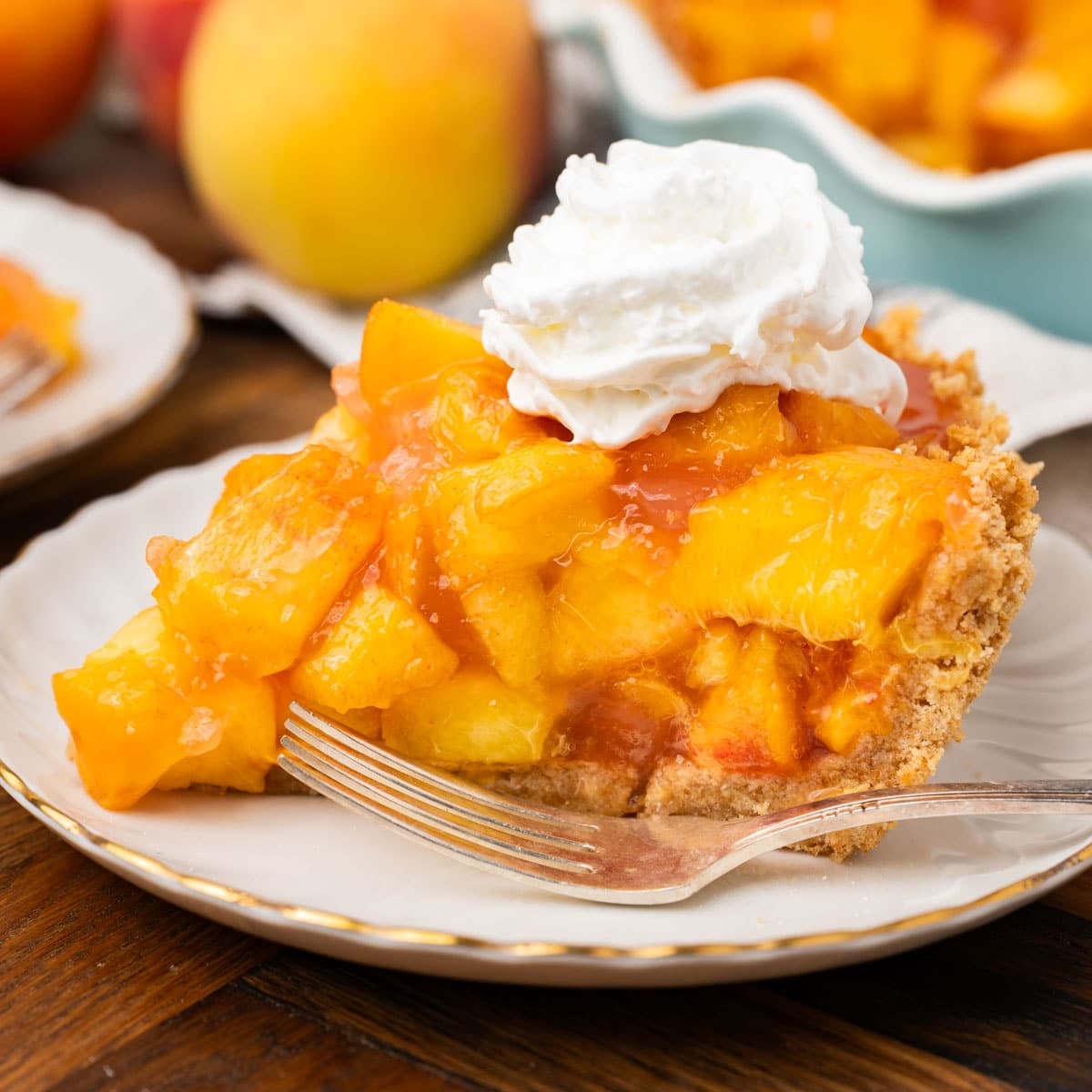 a piece of peach pie with jello on a plate