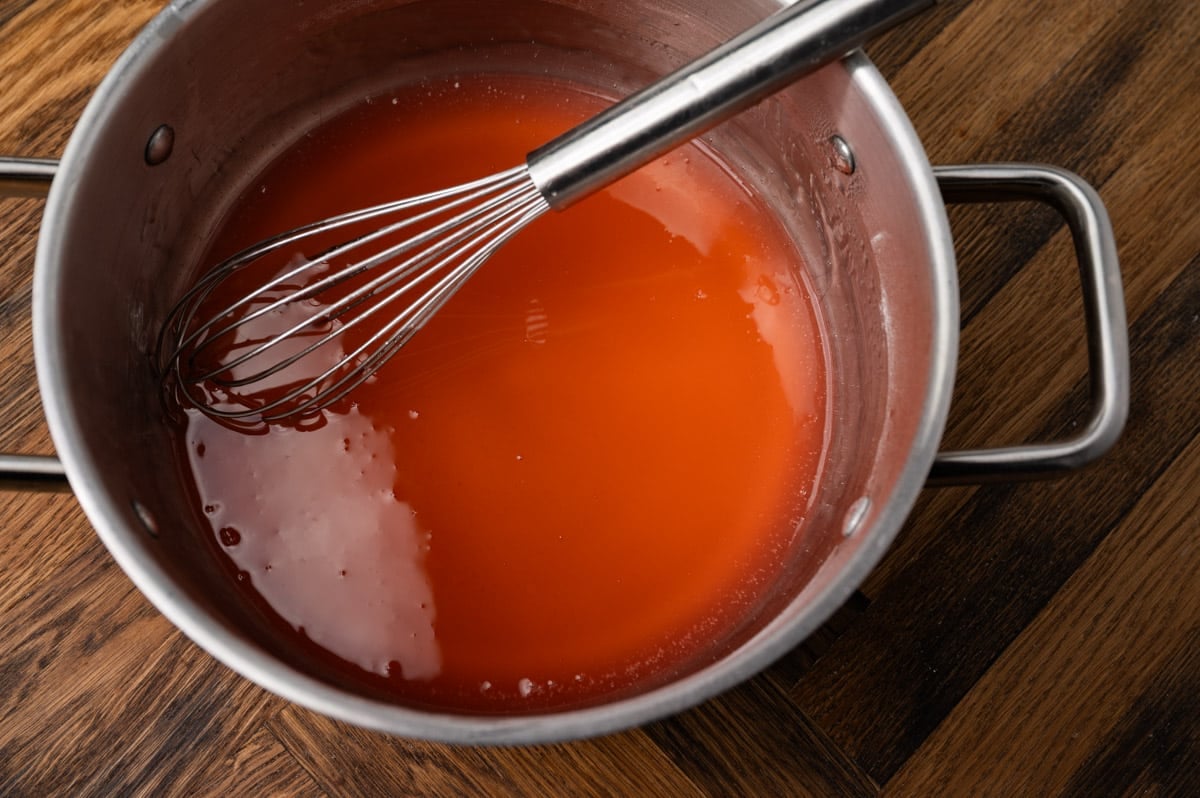 peach jello in a saucepan