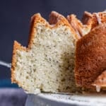 a slice of poppy seed cake on a plate