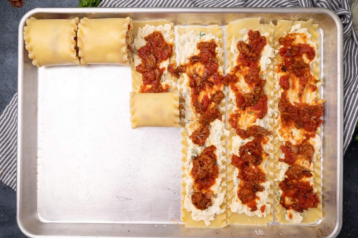 lasagna rollups half made in a pan