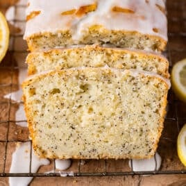 slices of lemon poppy seed bread sliced on a wire rack