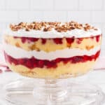a punch bowl cake in a glass bowl on a table