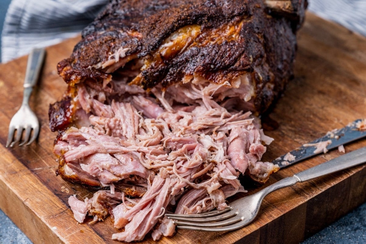 pulled pork on a cutting board